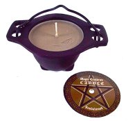 Sandalwood candle in cauldron